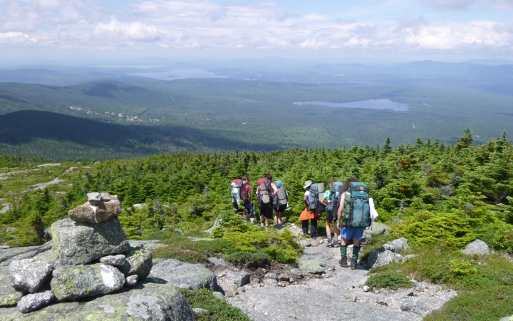 young adults backpacking in maine